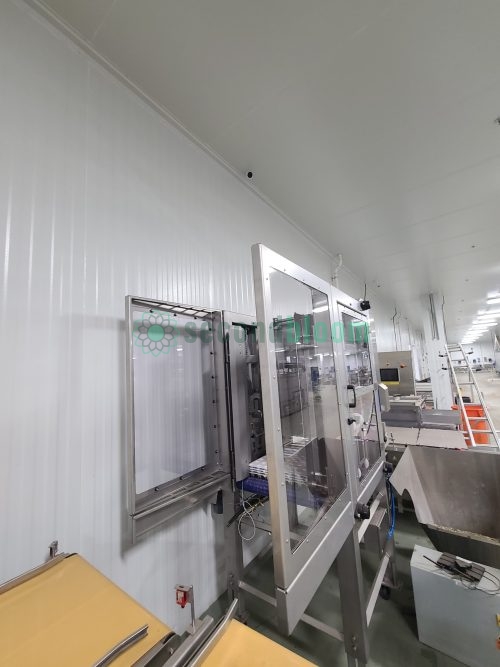 Viscon stacking system with transparent safety doors in food-grade white panel facility