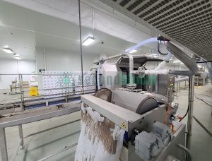 Viscon washing system showing drum assembly, ventilation connections, and drive motor in food processing facility