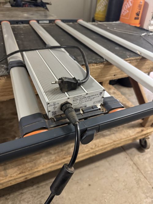 Angled view of Fluence SPYDR 2h47 with driver and power plug
