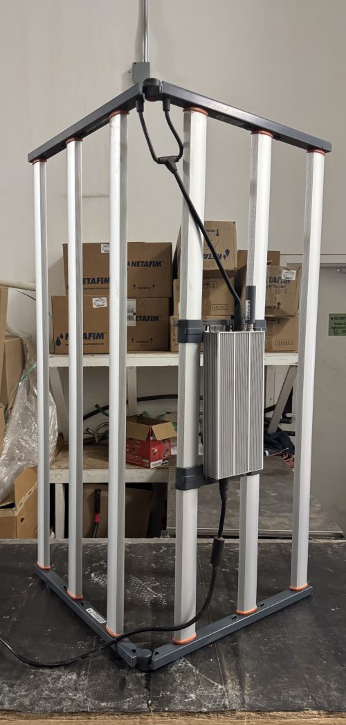 Fluence SPYDR 2h47 light hanging vertically with driver secured