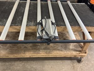 Top view of Fluence SPYDR 2i 47 LED grow light on workbench