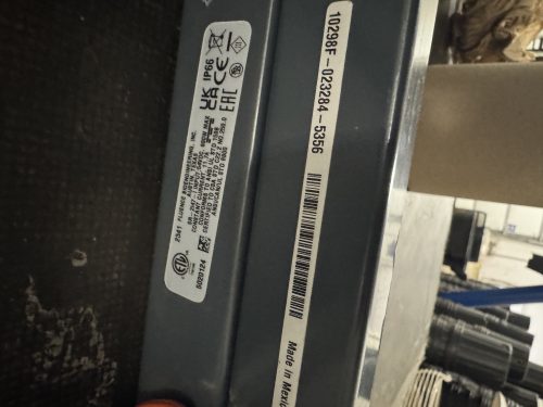 Side label with serial and compliance information on Fluence SPYDR