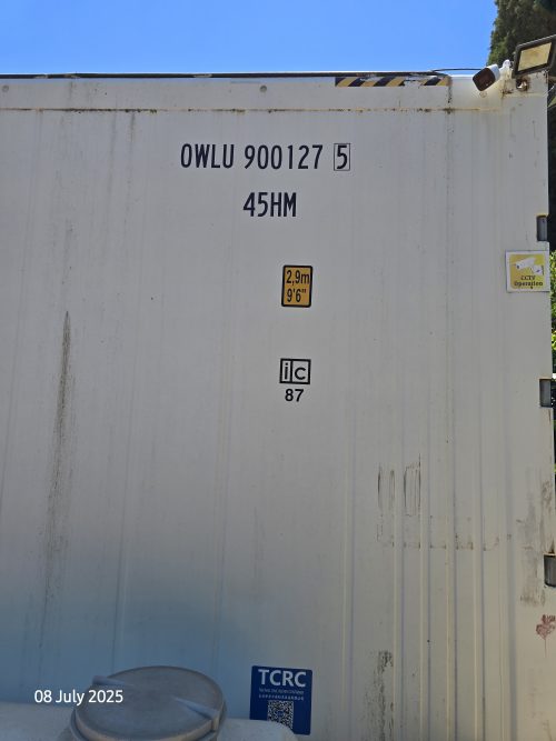 Freight Farms controlled environment agriculture shipping container exterior showing identification numbers for vertical farming facility