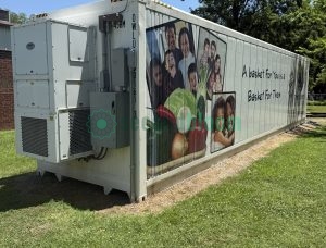 Freight Farms controlled environment agriculture container showing community-focused marketing and vertical farming social benefits