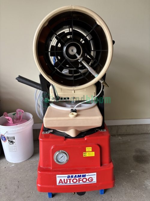 Full side view of Dramm AutoFog LVH-15NS showing complete mobile unit with cream-colored tank and red base