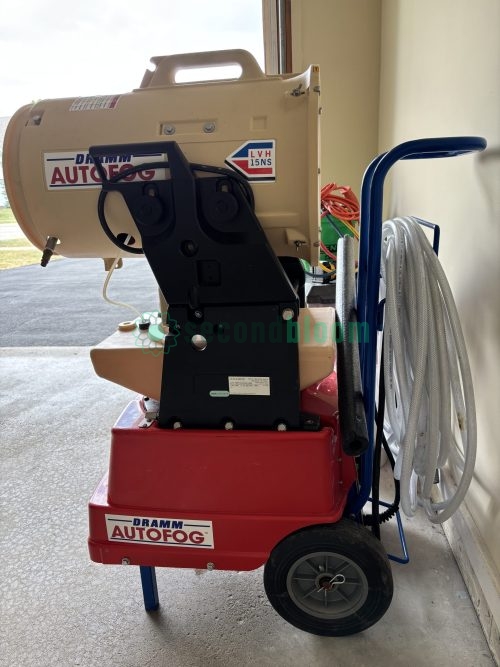 Different angle view of complete Dramm AutoFog unit showing tank, base, and mobility features