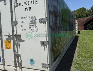 Freight Farms controlled environment agriculture container exterior showing shipping specifications and weight data for vertical farming facility